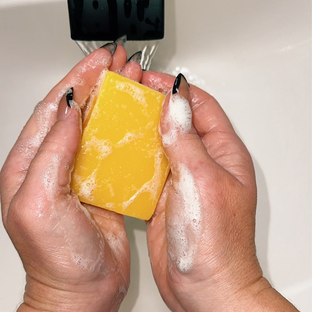 Brightening soap with lemon, turmeric, and kojic acid.