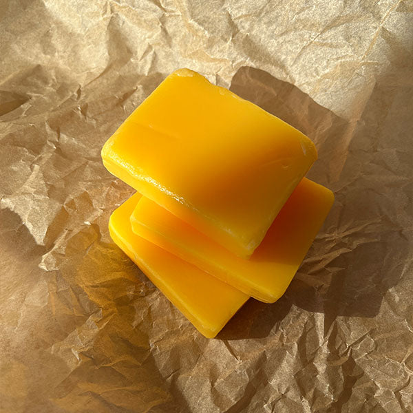 Brightening soap with lemon, turmeric, and kojic acid.