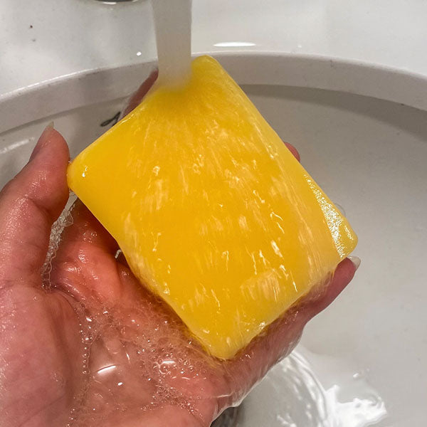 Brightening soap with lemon, turmeric, and kojic acid.